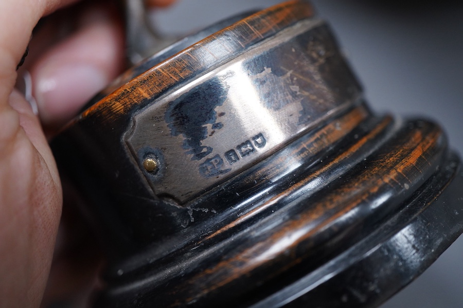 A bronze study of a classical discus thrower with silver mounted plaque to the base, 17cm high